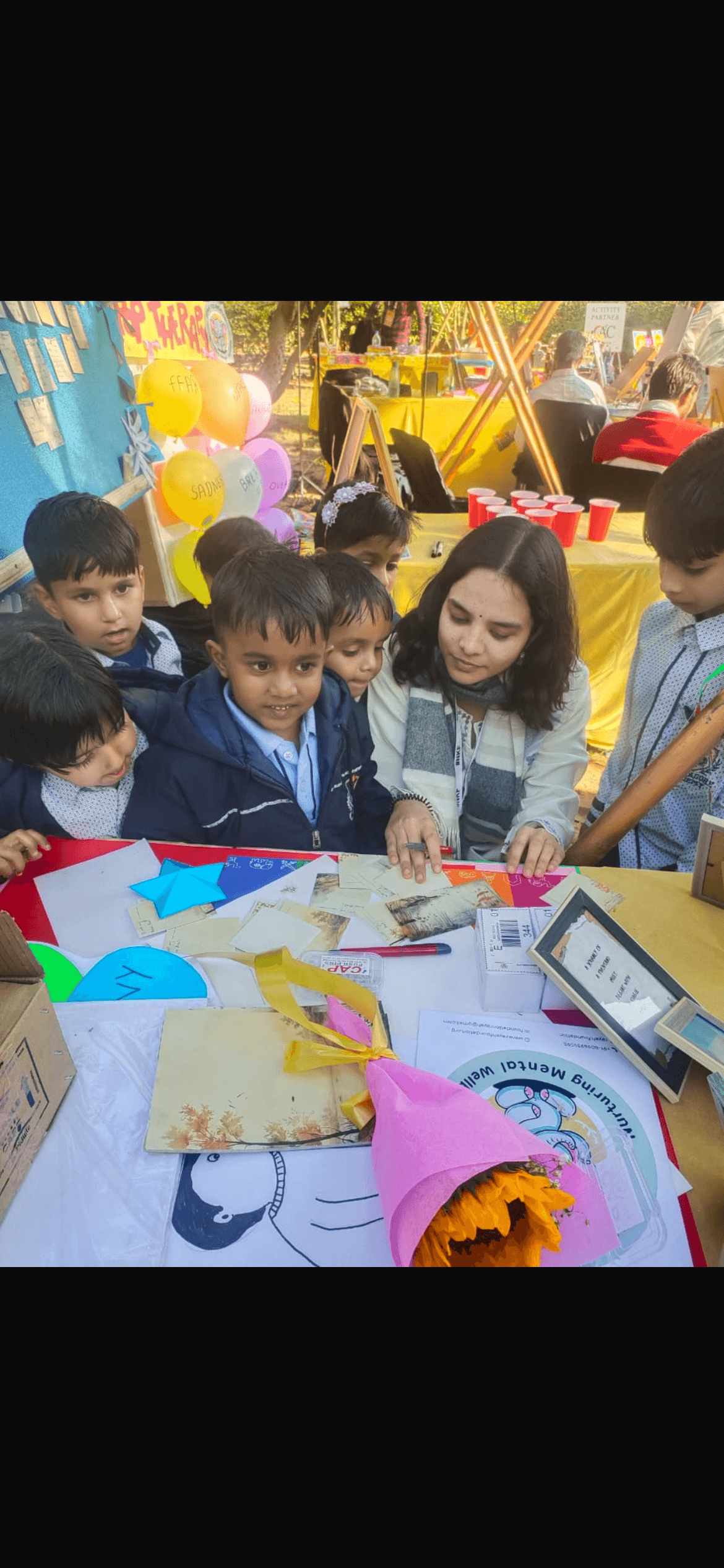 Rayah Minds team and participants during a child wellbeing session